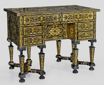 an ornately decorated desk with two drawers and two legs
