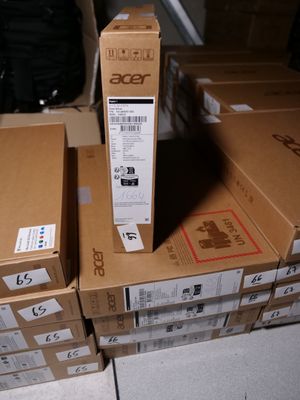 many boxes stacked on top of each other on the floor