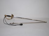 a sword that is laying on a white surface