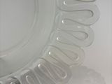 a glass plate with a decorative design on it