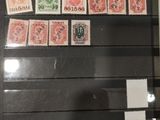 a picture of a collection of stamps in a display case