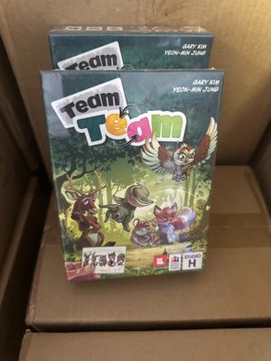 a box with a game on it sitting on a cardboard box