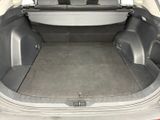 a trunk of a car with the back seats folded down