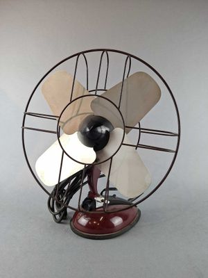 a small fan that is on top of a table