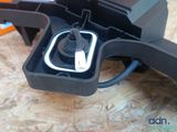 a close up of a gun with a charger attached to it