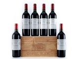 six bottles of red wine in a wooden crate on a white background