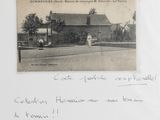 a black and white photo of a postcard with a picture of a house
