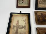 four framed pictures hanging on the wall next to each other