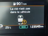 the dashboard of a car with a digital display showing the speed of the car