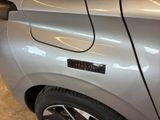 a close up of a car door with a sticker on it