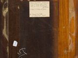 an image of a piece of wood with a piece of paper on it