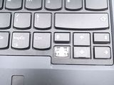a close up of a laptop keyboard on a table