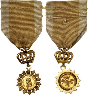 two medals with a medallion and a medal on a white background