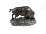 statue of a boar on a green base on a white background