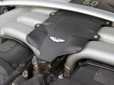 a close up of a car ' s engine with its hood open