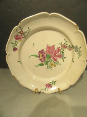 20.65 - ASSIETTE EN FAIENCE DE STRASBOURG (?) (cheveux et ma…
