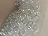 bottles of water sitting on top of a table in a room