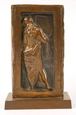 bronze sculpture of a woman in a dress holding a glass