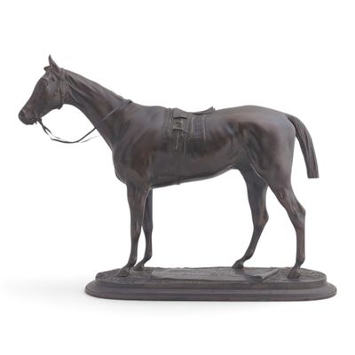 a statue of a horse that is standing on a base