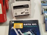 a lot of electronic items that are on the table
