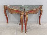 two tables that are sitting side by side on the floor