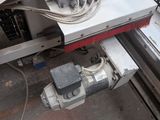 an image of a machine that is working on a piece of equipment