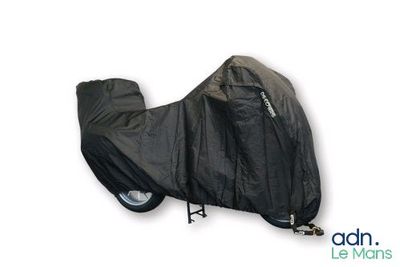 the motorcycle cover is black and has a zipper on the side