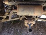 a close up view of a vehicle ' s exhaust pipe and exhaust pipe