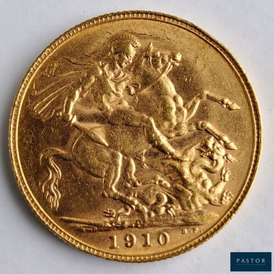 l'image d'un gros plan d'une pièce d'or sur une surface blanche