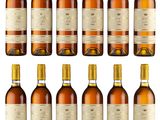 a group of bottles of wine sitting on top of each other