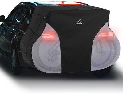 a black car with two speakers in the back
