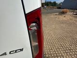a white truck that is parked on the side of the road