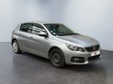 the silver car is parked in a white room with a black floor