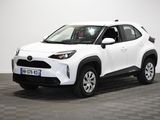 a white toyota c - hr suv parked on a checkered floor