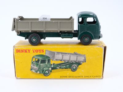 a toy truck that is sitting on top of a box