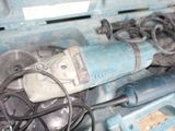 a blue tool box filled with assorted tools