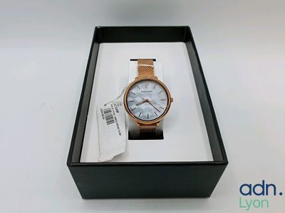an image of a watch in a box on a white surface