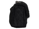 the small black purse has a chain hanging from it