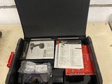 a black case with a lot of items inside of it