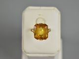 an image of a ring with a citrine stone in it
