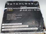 an image of a box of black tape on a white surface