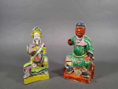 pair of chinese figurines of a man and a woman