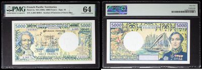 three different types of currency are on display in a display case