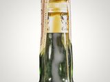 a bottle of wine that is sitting on a table