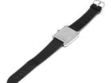 black leather watch strap with silver buckle on a white background