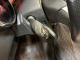 a close up of a steering wheel on a motorcycle