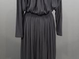 the back view of a black dress on a mannequin mannequin mannequin mannequin mannequin mannequin mannequin manne
