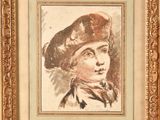 portrait of a young boy in a beret, framed in a gold frame
