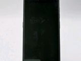 a cell phone that is sitting on a stand