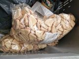 a bag of cookies sitting in a bin on the counter